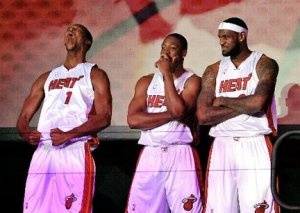 lebron-james-chris-bosh-dwyane-wade-introduced-in-miami-7821fbe30df9302c_large